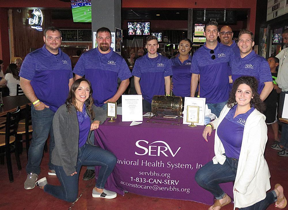 Members of the Young Professionals Group include, from left, back row, Justin Stedman, treasurer; Tim Smith, president; Eric Goldman, membership chair; Joanna Adu; Patrick Brogan, vice president; Albie Delgado; Nathan Arronson; front row, Deanna Balerno-Ireland and Juli Coppola. Members of the Young Professionals Group