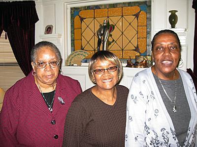 Pearl Hadley, center, a family care provider with SERV Centers of New Jersey-Hudson County, is flanked by two of the three SERV consumers who live in her home in Jersey City – Elsie, left, and Rosa.